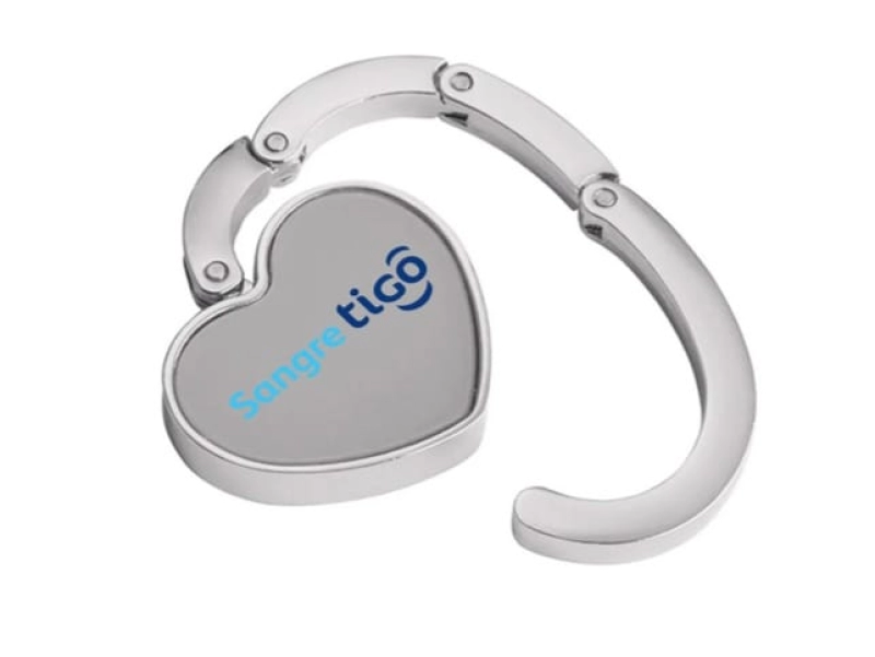 Gancho Porta Carteras plegable metalico forma de corazón, 5 cmts diametro