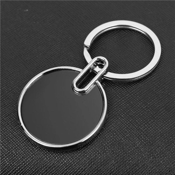 Llavero Moon, metalico, con marco plateado e interior negro, diametro 3.1 cmts