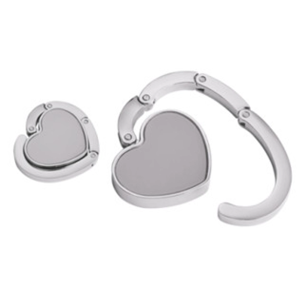 Gancho Porta Carteras plegable metalico forma de corazón, 5 cmts diametro